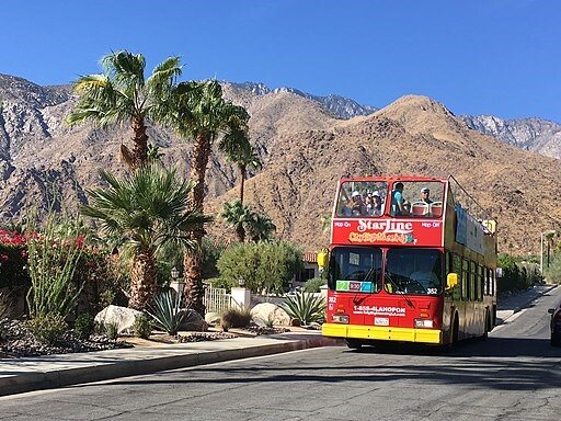 Palm Springs Mid Century Modernism Week features fun double-decker buses for tours of the homes. Photo courtesy of Abbe Rose