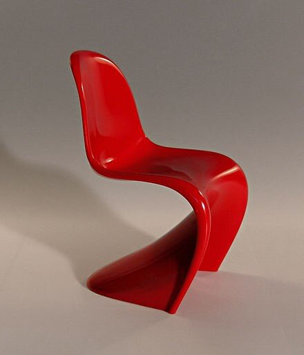 The Panton single-mold plastic chair, called the Stacking Chair. 